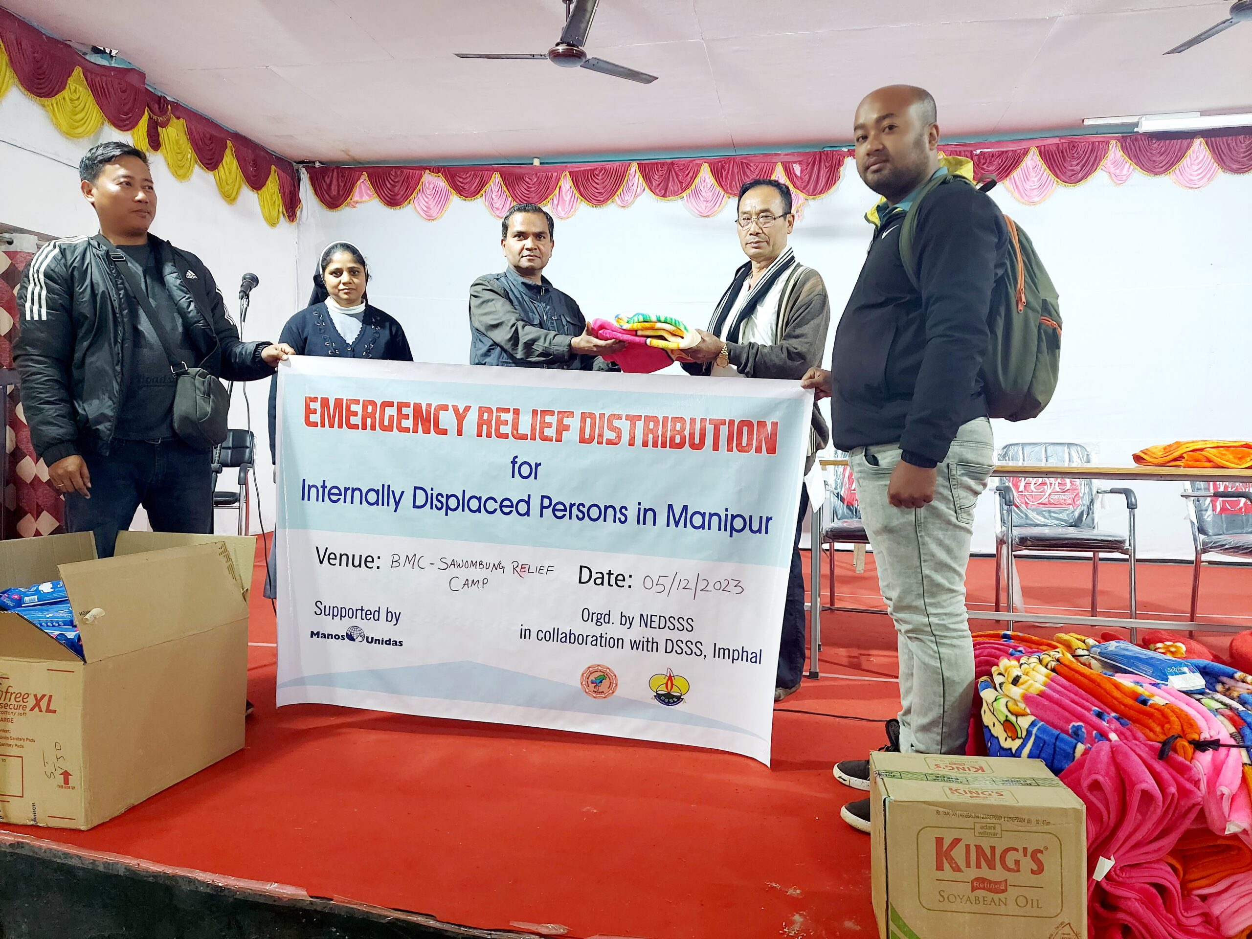 Relief items distribution at Sawombung